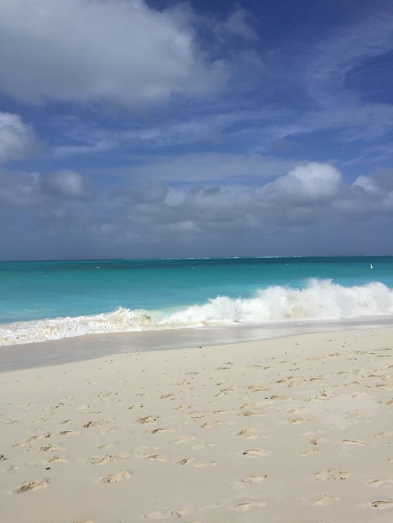 Empty beach and turquoise waves in Turks and Caicos